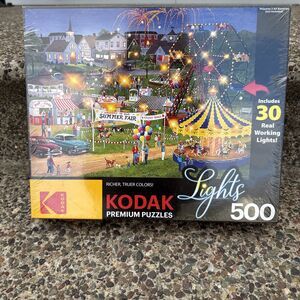 Kodak Light Up Country Fair 500 Piece Jigsaw Puzzle. New still an original wrap.